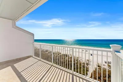 a balcony with a view of the ocean at Dreamscape 30! Luxury Beach Front Property! in Panama City Beach