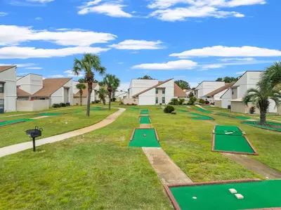 a row of mini golf courts in a residential neighborhood at Horizon South 56 - 206 in Panama City Beach