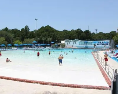 a group of people in a swimming pool at Horizon South 56 - 206 in Panama City Beach