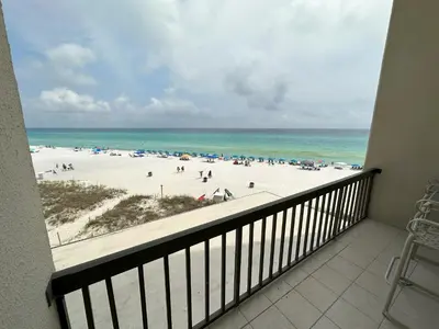 a balcony with a view of a beach at Beautiful Beach Front Condo at Pinnacle Port A-125 in Panama City Beach