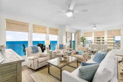 a living room with a view of the ocean at Treasure Island #2112 in Panama City Beach