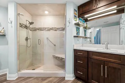 a bathroom with a shower and a sink at Treasure Island #2112 in Panama City Beach