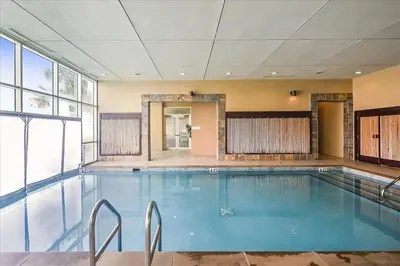 a large swimming pool in a building at Aqua 511 in Panama City Beach