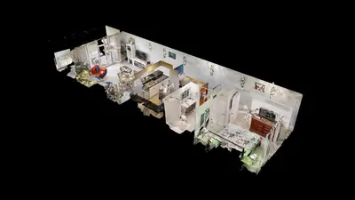 an overhead view of a kitchen and living room at Emerald Beach 1835 in Panama City Beach