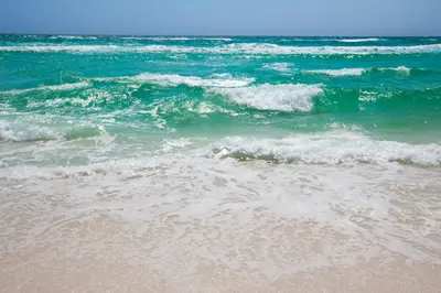 a view of the ocean from the beach at Emerald Beach Resort 234 | Roo’s Rendezvous in Panama City Beach