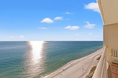 a view of the beach from the balcony of a condo at Emerald Beach Resort 2028 in Panama City Beach