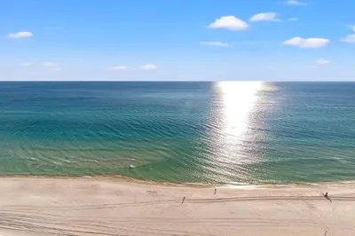 an aerial view of the beach and the ocean at Emerald Beach Resort 2028 in Panama City Beach