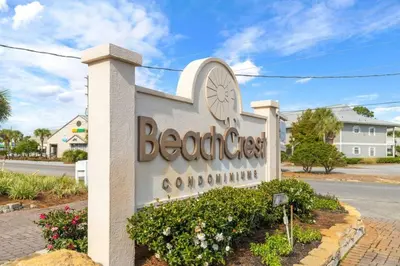 a sign for the beachside condominiums building at NEW 30A Beachfront Condo with Pool and 4 Beds with Gulf Views in Santa Rosa Beach