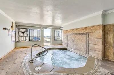 a hot tub in the middle of a room at Regency Towers PCB Condo Beach Access and 2 Pools in Panama City Beach