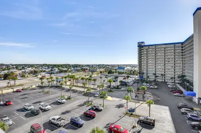 an aerial view of a parking lot with cars at Regency Towers PCB Condo Beach Access and 2 Pools in Panama City Beach