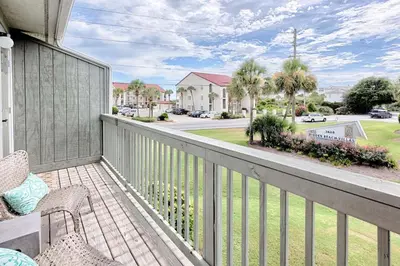 a balcony with a view of a street at Suite Y'all in Santa Rosa Beach