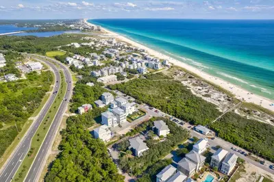 an aerial view of the beach and the ocean at Wonderful World in Inlet Beach