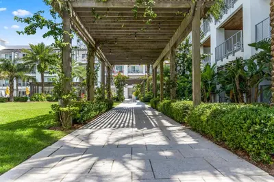 a walkway in front of a building at Shore Beats Workin' in Inlet Beach