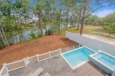 an overhead view of a deck with a swimming pool at Paralia 30A in Seagrove Beach