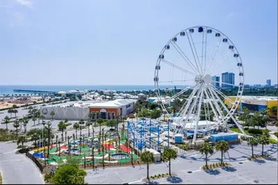 an amusement park with a ferris wheel at Calypso 1007E in Panama City Beach