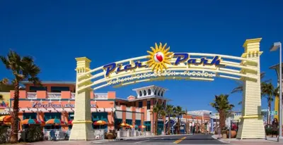a sign in front of a hotel with a sign at Calypso 1007E in Panama City Beach