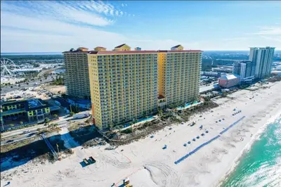 an aerial view of a hotel and the beach at Calypso 1007E in Panama City Beach