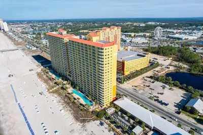 an aerial view of a hotel and the beach at Calypso 1607E in Panama City Beach