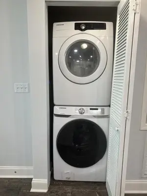 a washing machine and a washer in a room at Aqua 603 in Panama City Beach