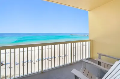 a balcony with a view of the beach at Calypso 803W in Panama City Beach
