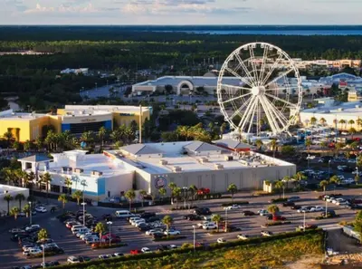 an aerial view of a city with a ferris wheel at Aqua 1003 in Panama City Beach