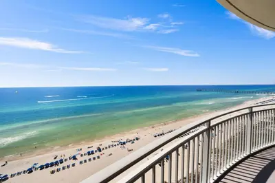 a view of the beach from a balcony at 1403 Aqua in Panama City Beach