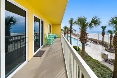 a balcony with a view of the beach at Calypso 209E 2nd floor Corner Unit 2 BR direct beach front in Panama City Beach