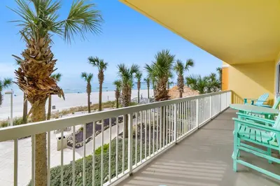 a balcony with a view of the beach at Calypso 209E 2nd floor Corner Unit 2 BR direct beach front in Panama City Beach