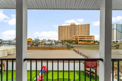 a view of the city from the balcony of a building at Spring Break! Heated Pool, Walk 2 Beach, Sleeps 11 in Panama City Beach