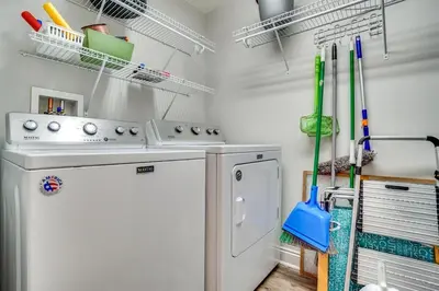 a kitchen with a stove and a refrigerator at Calypso 909 West Tower GULF FRONT 3BR 3BA Views Forever in Panama City Beach