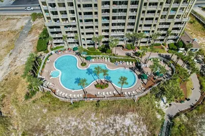 an overhead view of a large building with a swimming pool at Grand Panana 106 in Panama City Beach
