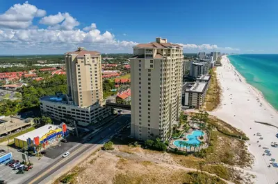 an aerial view of a beach and buildings and the ocean at Grand Panana 106 in Panama City Beach