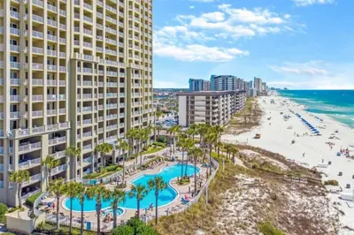 an aerial view of a hotel and the beach at Grand Panama 207 in Panama City Beach