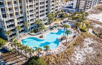 an aerial view of a swimming pool at a resort at Grand Panama 407 in Panama City Beach
