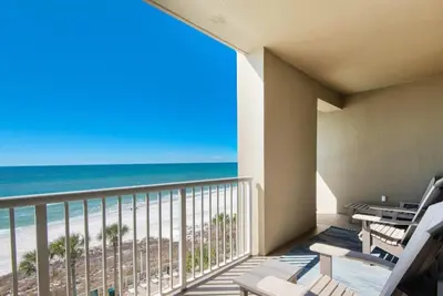 a balcony with a view of the beach at Grand Panama 604 in Panama City Beach