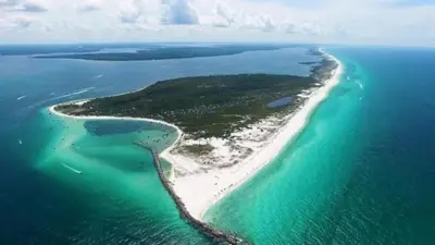 an aerial view of an island in the ocean at Calypso 1601W Gulf Front Corner unit Fantastic Specials in Panama City Beach