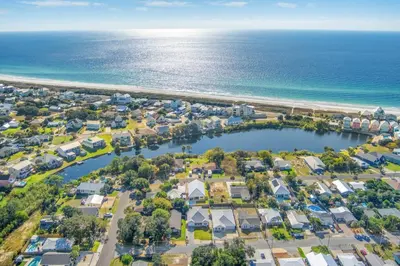 an aerial view of a neighborhood next to the beach at Laid-Back - Private Pool, 4 Min Walk to Beach, Close to 30A, FREE Daily Activities in Panama City