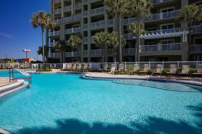 a large swimming pool in front of a building at Grand Panama 902 in Panama City Beach