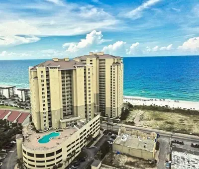 an aerial view of a hotel near the ocean at Grand Panama 909 in Panama City Beach