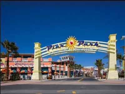 a large entrance to a resort with a sign at Grand Panama 1204 in Panama City Beach