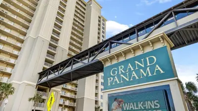 a sign for a grand pamana hotel in front of a building at Grand Panama 1307 in Panama City Beach