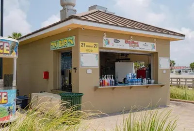 a small building with a store with a window at Grand Panama 1405 in Panama City Beach