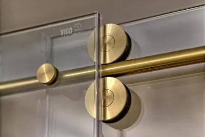a close up of a glass door with brass knobs at Sterling Breeze 1506 in Panama City Beach