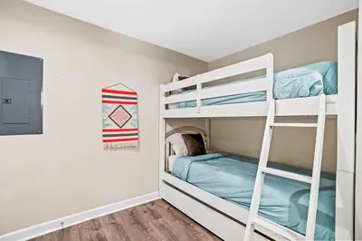 a bunk bed room with two bunk beds at Splash 903W in Panama City Beach