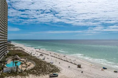 a view of a beach with people and the ocean at Sunrise Beach 801 in Panama City Beach