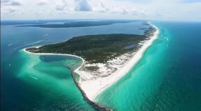 an aerial view of an island in the ocean at Sunrise Beach 801 in Panama City Beach