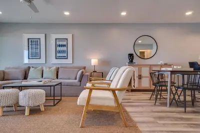 a living room with a couch and a table at Ramsgate 22 Premium Quality One level Fully Renovated in Panama City Beach
