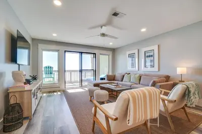a living room with a couch and a table at Ramsgate 22 Premium Quality One level Fully Renovated in Panama City Beach