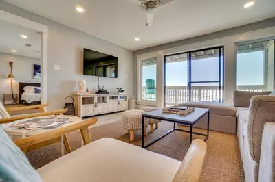 a living room with a couch and a table at Ramsgate 22 Premium Quality One level Fully Renovated in Panama City Beach