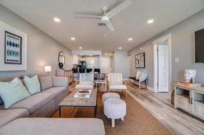 a living room with a couch and a table at Ramsgate 22 Premium Quality One level Fully Renovated in Panama City Beach